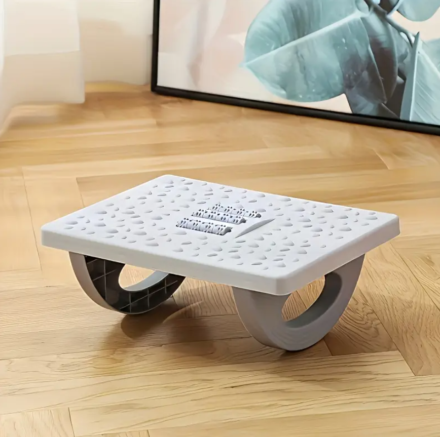 Descansa pies ergonómico con masajeador