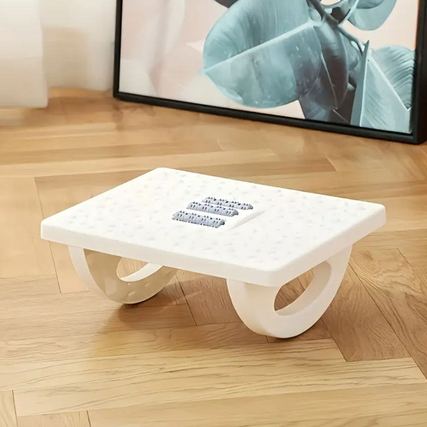 Descansa pies ergonómico con masajeador